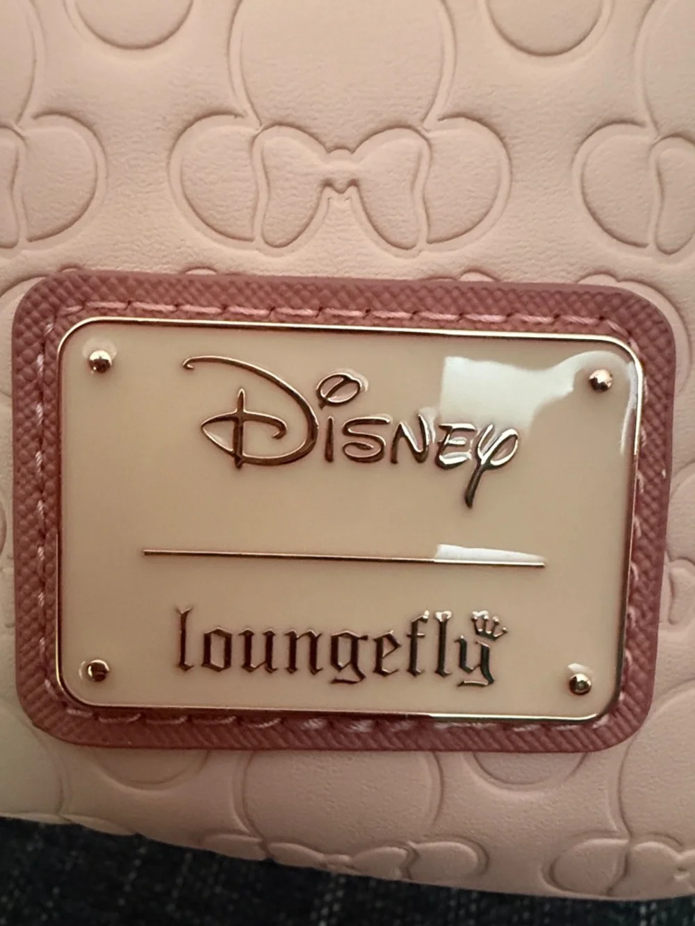 Loungefly Minnie Mouse Embossed Pink Mini Backpack with Rose Gold Bow